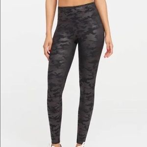 Spanx- NWT leggings black camo. Size M. Smooth, shape, sculpt is what it says!